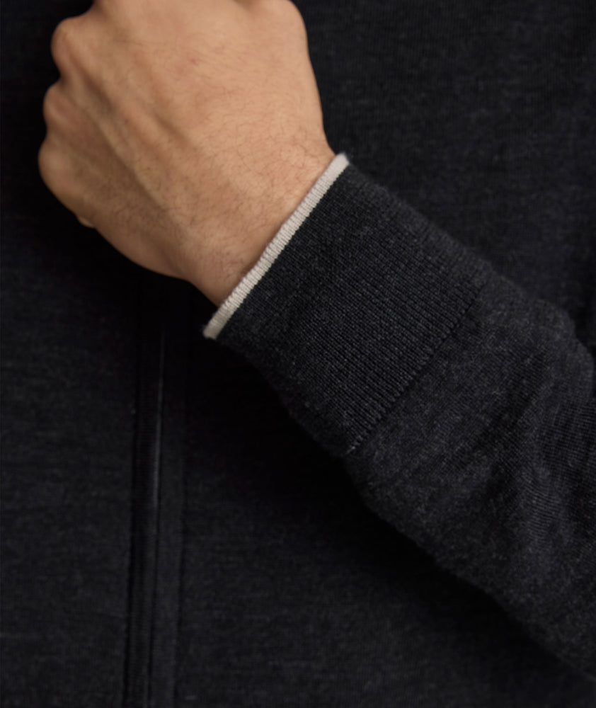 Model is wearing UNTUCKit Alston Full-Zip in Navy.