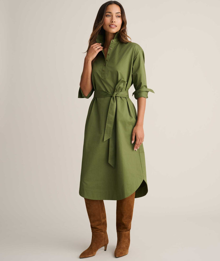 Model is wearing UNTUCKit Denim Popover Amanda Shirtdress in green. 