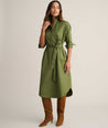 Model is wearing UNTUCKit Denim Popover Amanda Shirtdress in green. 