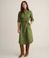 Model is wearing UNTUCKit Denim Popover Amanda Shirtdress in green. 