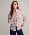 Model is wearing UNTUCKit Antonia plaid shirt. 