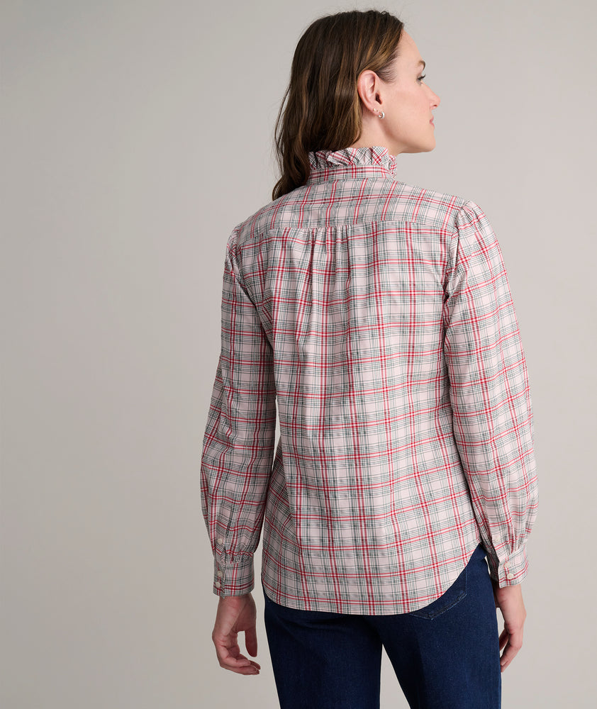 Model is wearing UNTUCKit Antonia plaid shirt. 