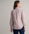 Model is wearing UNTUCKit Antonia plaid shirt. 