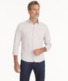 Model is wearing UNTUCKit Wrinkle-Free Performance Apremont Shirt in White & Marooon Check.
