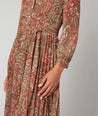 Model is wearing UNTUCKit Arabella printed dress.