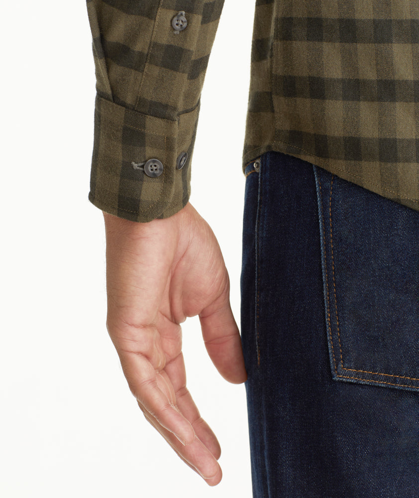 Model is wearing UNTUCKit Wrinkle-Free Performance Flannel Archie Shirt in Forest Green.