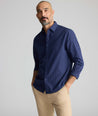 Model wearing a navy UNTUCKit Arnold Shirt.