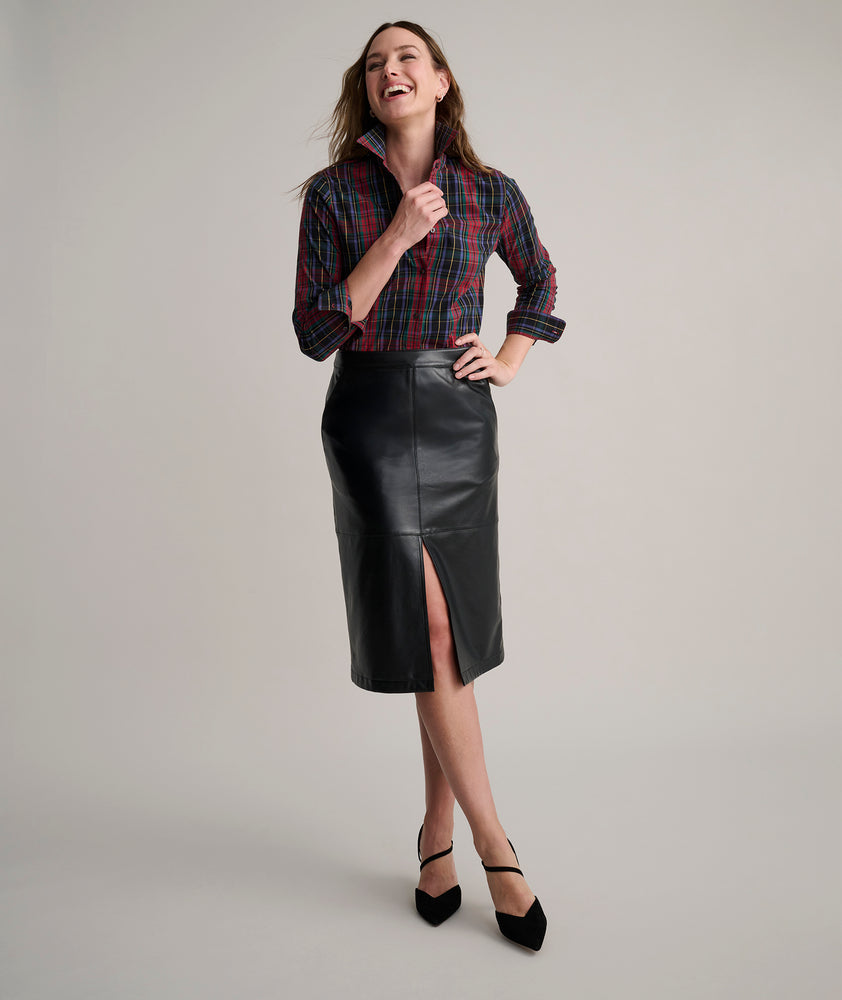 Model is wearing UNTUCKit Aubrey faux leather skirt.