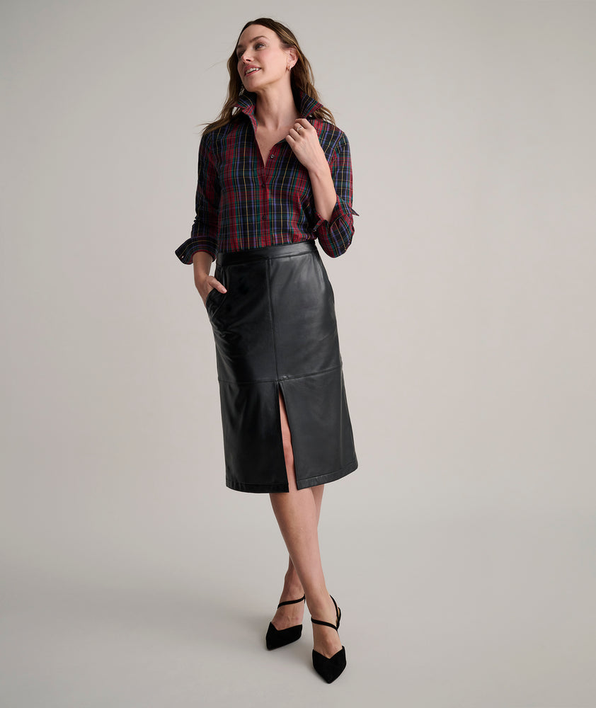 Model is wearing UNTUCKit Aubrey faux leather skirt.