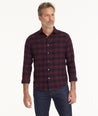 Model is wearing UNTUCKit Flannel Barrelstone Shirt in Maroon & Black Check.