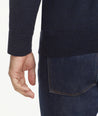 Model is weraring UNTUCKit Belguardo quarter zip in navy.