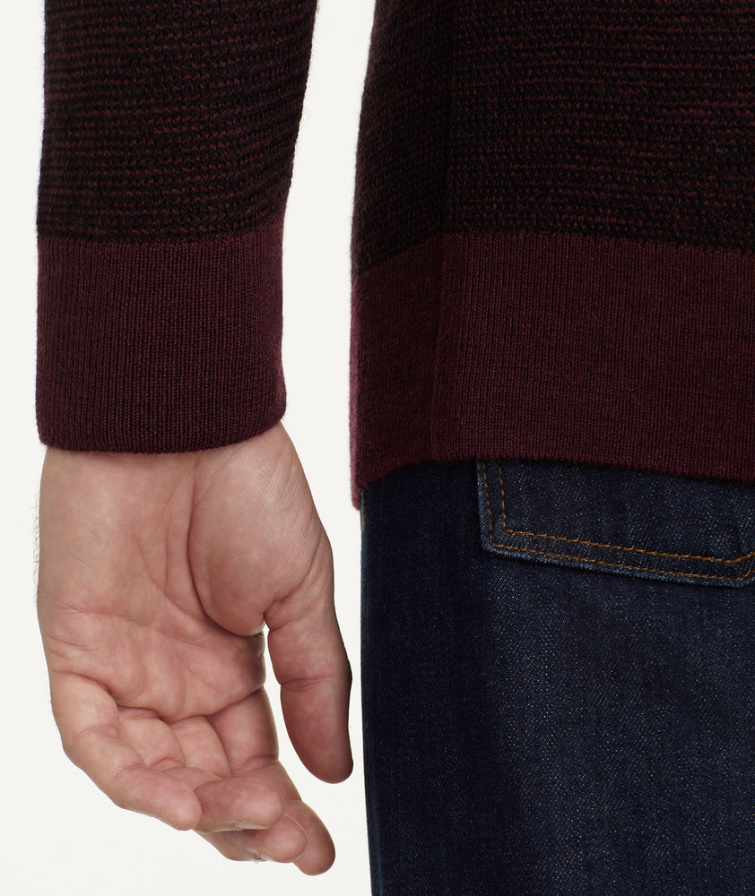 Model is wearing UNTUCKit Birdseye Merino Wool Quarter-Zip Sweater in Deep Purple.