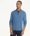 Model is wearing UNTUCKit Belhuardo quart zip in heather blue.