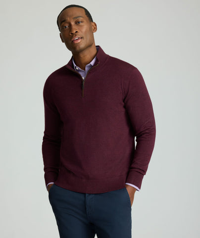 Model is wearing UNTUCKit Belguardo quarter zip in solid maroon. 