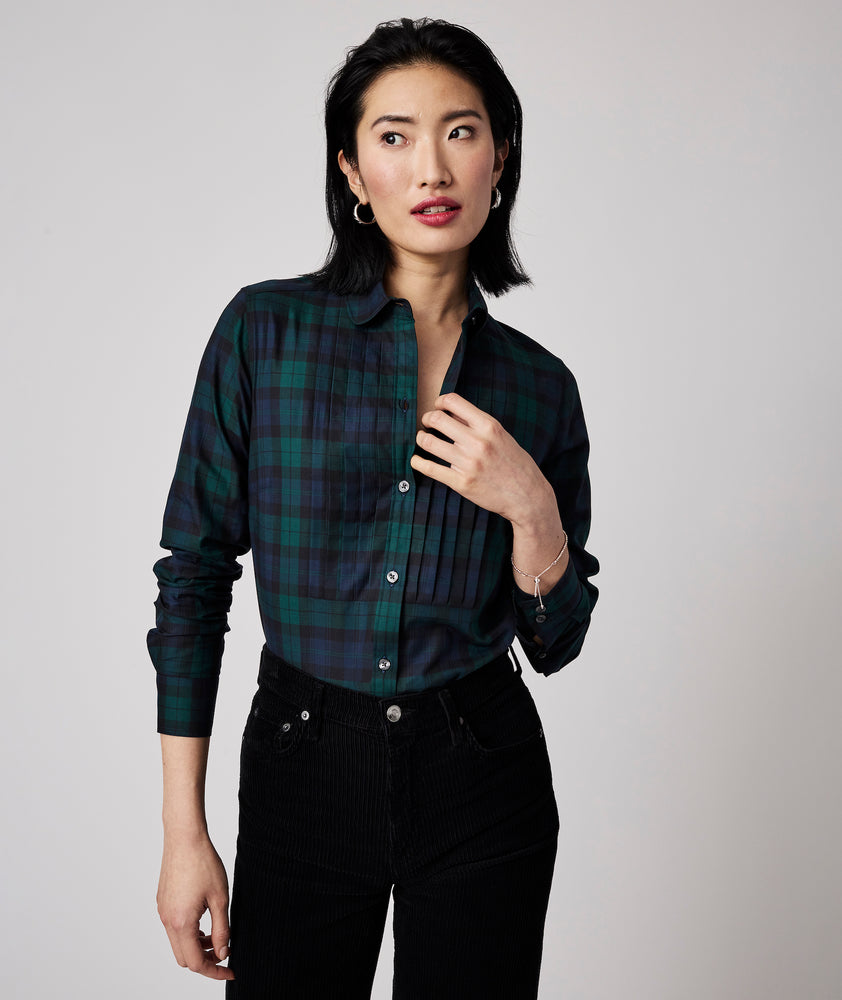 Model is wearing UNTUCKit Belinda shirt in plaid navy. 