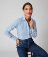Model is wearing the UNTUCKit Bella Shirt in Blue Stripe. 