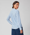 Model is wearing the UNTUCKit Bella Shirt in Blue Stripe. 
