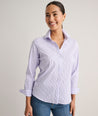 Model is wearing UNTUCKit Wrinkle- Free Cotton Stretch Bella Shirt in purple strip. 