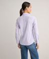 Model is wearing UNTUCKit Wrinkle- Free Cotton Stretch Bella Shirt in purple strip. 