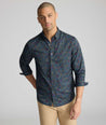Model is wearing UNTUCKit Performance Bellaqua Shirt. 