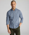 Model wearing a blue plaid cottontek shirt.