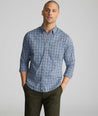Model wearing a blue plaid cottontek shirt.