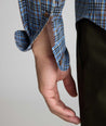 Model wearing a blue plaid cottontek shirt.