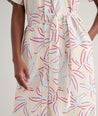 Model is wearing UNTUCKit Betty floral dress.
