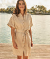 Model is wearing UNTUCKit Betty solid khaki dress. 