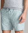 Model is wearing UNTUCKit Beyond short in Green Milieu McIntire Print.