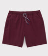 Model is wearing UNTUCKit beyond short in Burgundy. 