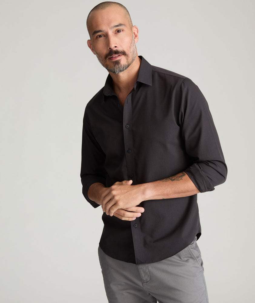 Model is wearing UNTUCKit Blackstone shirt.