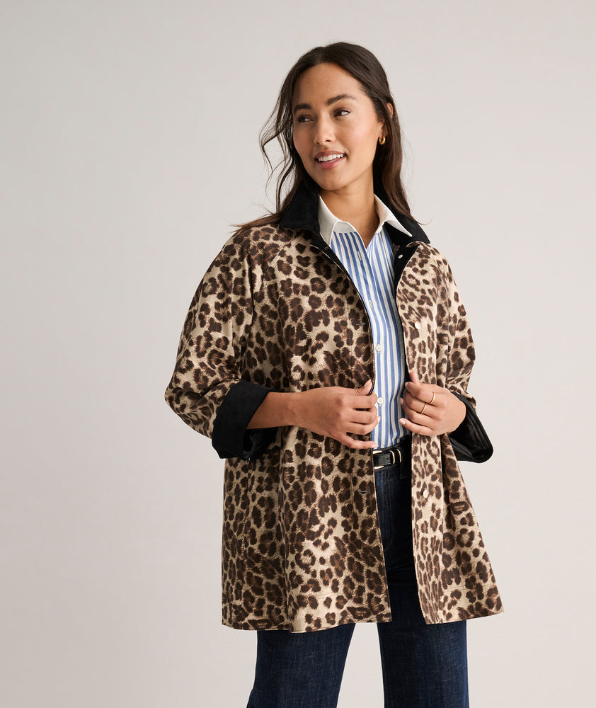 Model is wearing UNTUCKit Black coat in Leopard. 