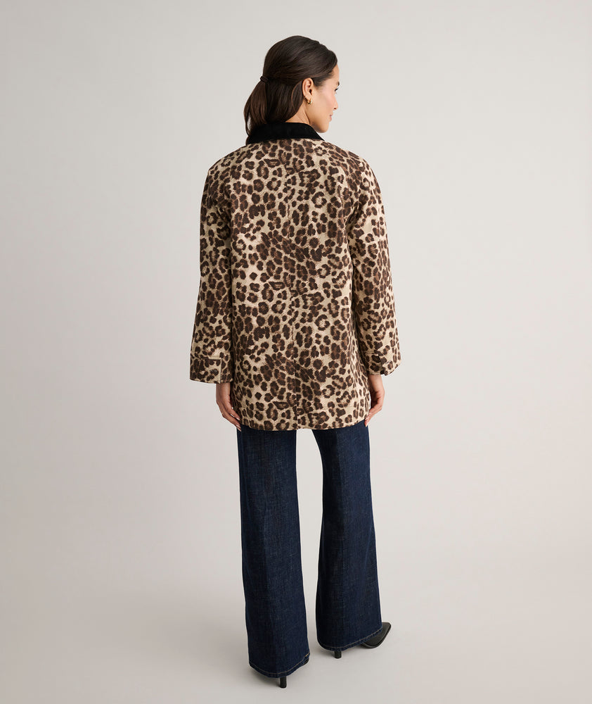 Model is wearing UNTUCKit Black coat in Leopard. 
