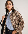 Model is wearing UNTUCKit Black coat in Leopard. 