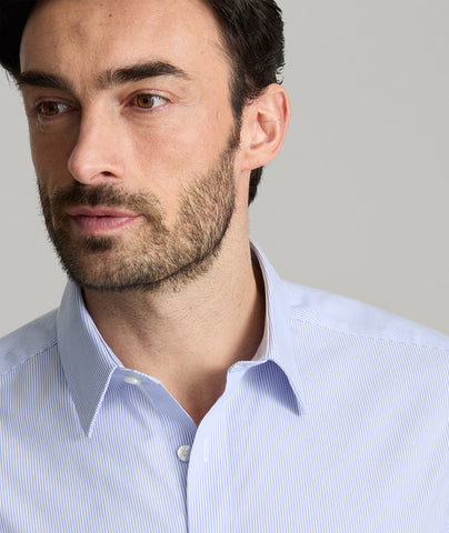 Model is wearing UNTUCKit Bordeaux shirt. 