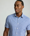 Model is wearing UNTUCKit Performance Short-Sleeve Bradshaw Shirt. 