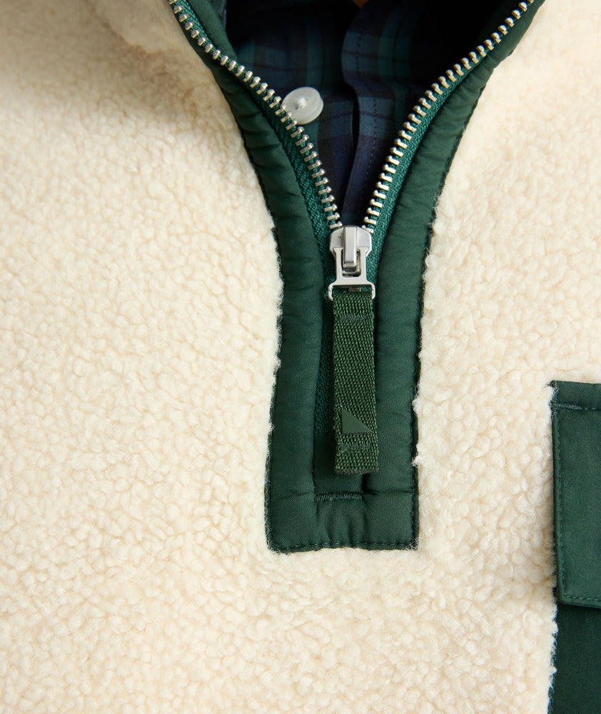 Model is wearing UNTUCKit Sherpa Pullover. 