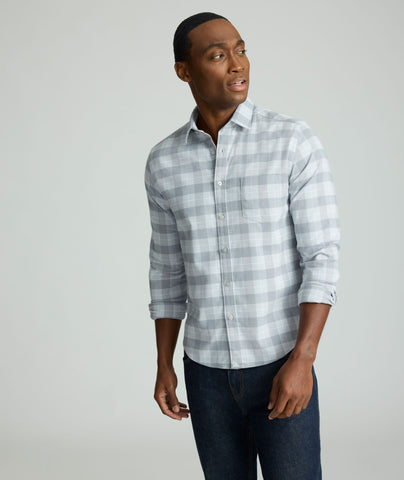 Model is wearing UNTUCKit Performance Flannel Brightlake Shirt in gray.