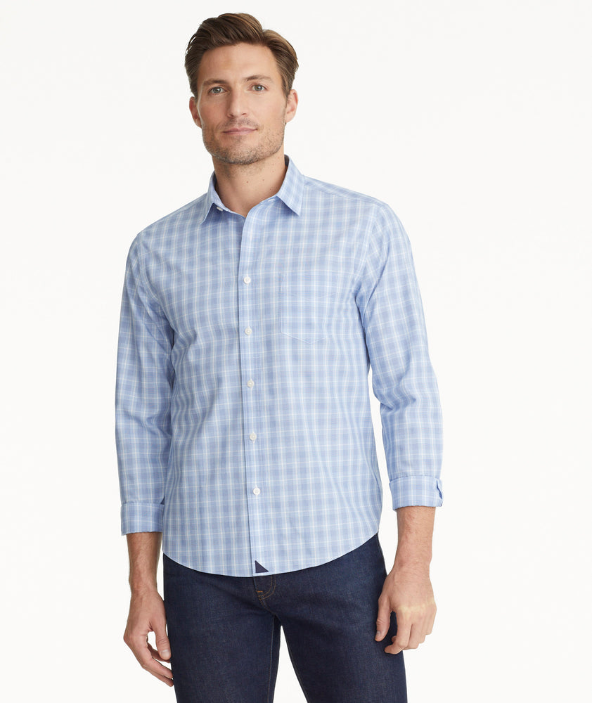 Model is wearing UNTUCKit Brooks wrinkle-free shirt.