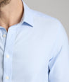 Model is wearing UNTUCKit burke in blue. 