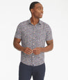 Model is wearing UNTUCKit Caberlot short-sleeve button down.