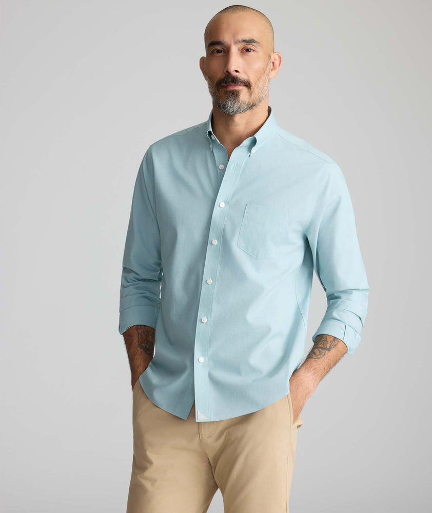 Model is wearing UNTUCKit Wrinkle-Free Cadetto Shirt in Light Green.