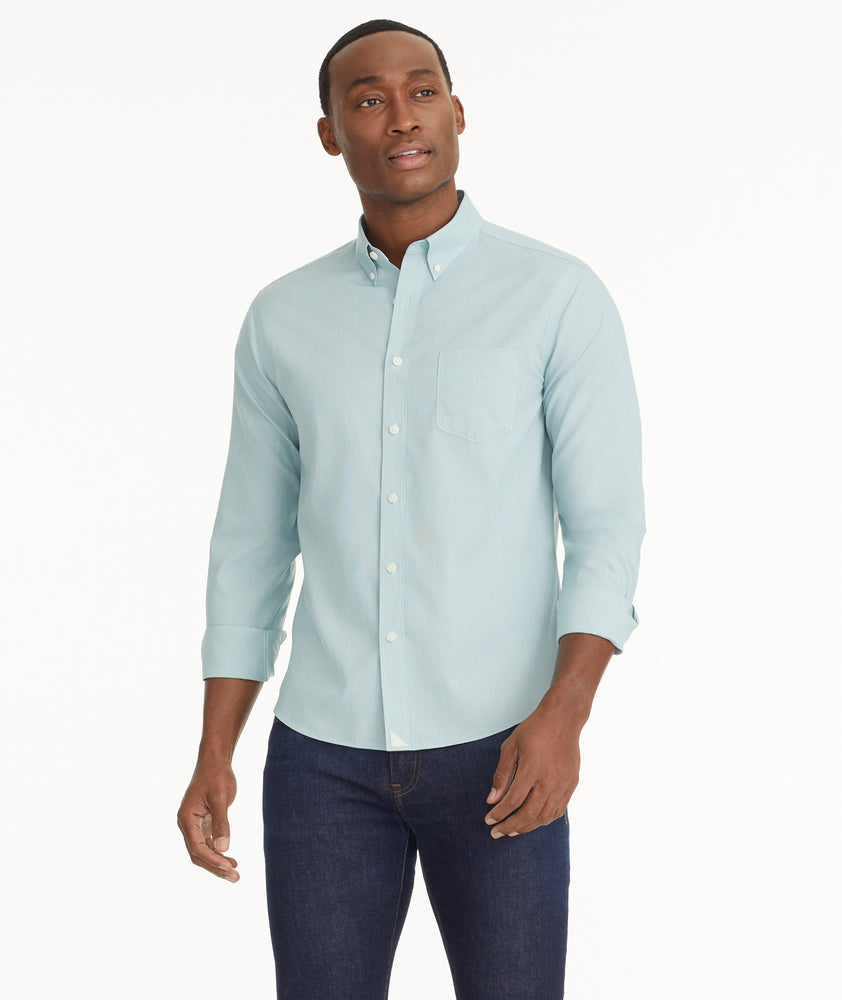Model is wearing UNTUCKit Wrinkle-Free Cadetto Shirt in Light Green.