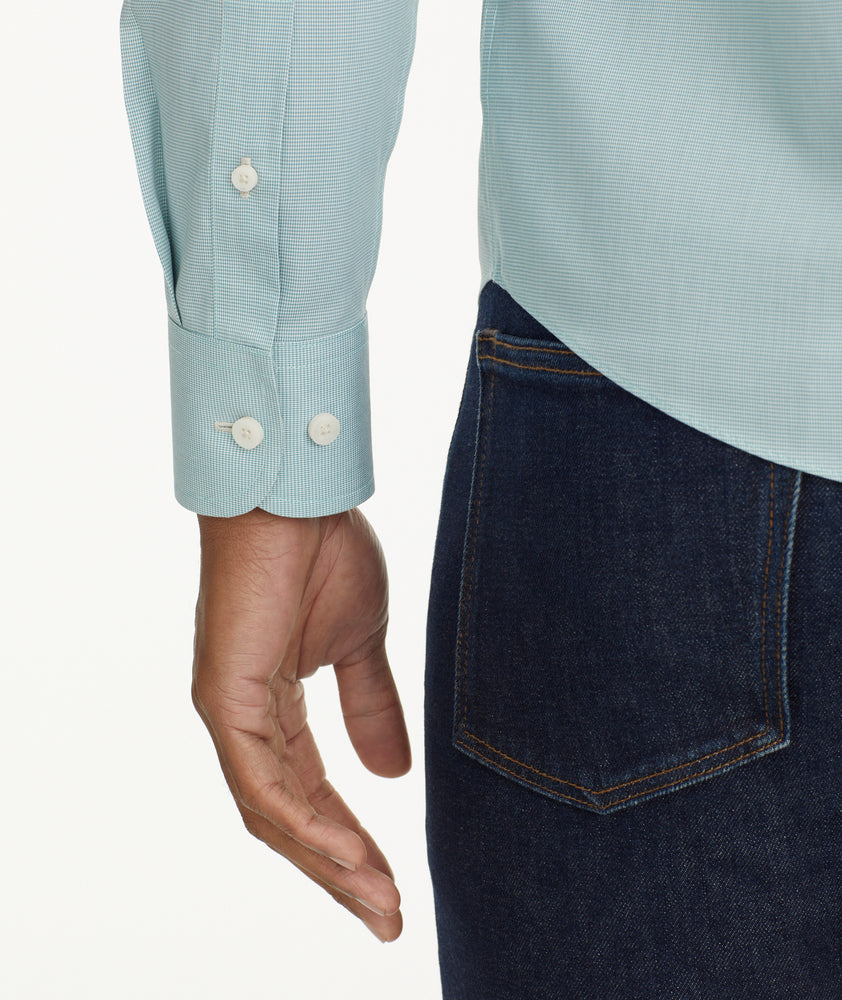 Model is wearing UNTUCKit Wrinkle-Free Cadetto Shirt in Light Green.