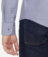 Model is wearing UNTUCKit Wrinkle-Free Cadetto Shirt in Navy.