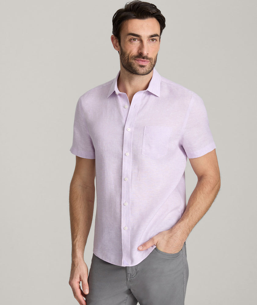 Model wearing an UNTUCKit lavender Wrinkle-Resistant Linen Short-Sleeve Cameron Shirt.