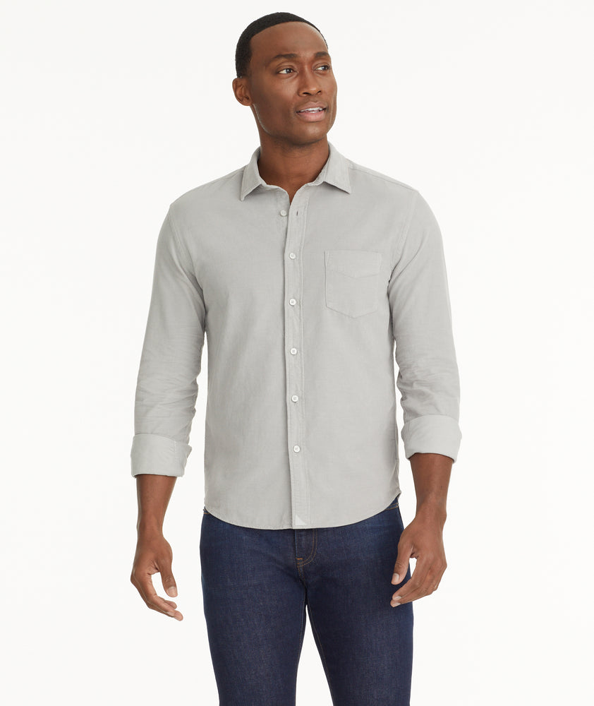Model is wearing UNTUCKit Cord Shirt in Gray.