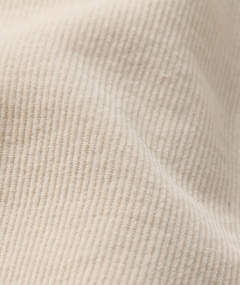 Model is wearing UNTUCKit Cord Shirt in fog. 