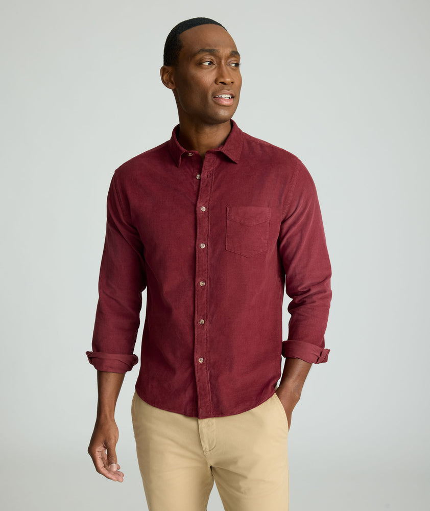 Model is wearing UNTUCKit Cord Shirt in Syrah.